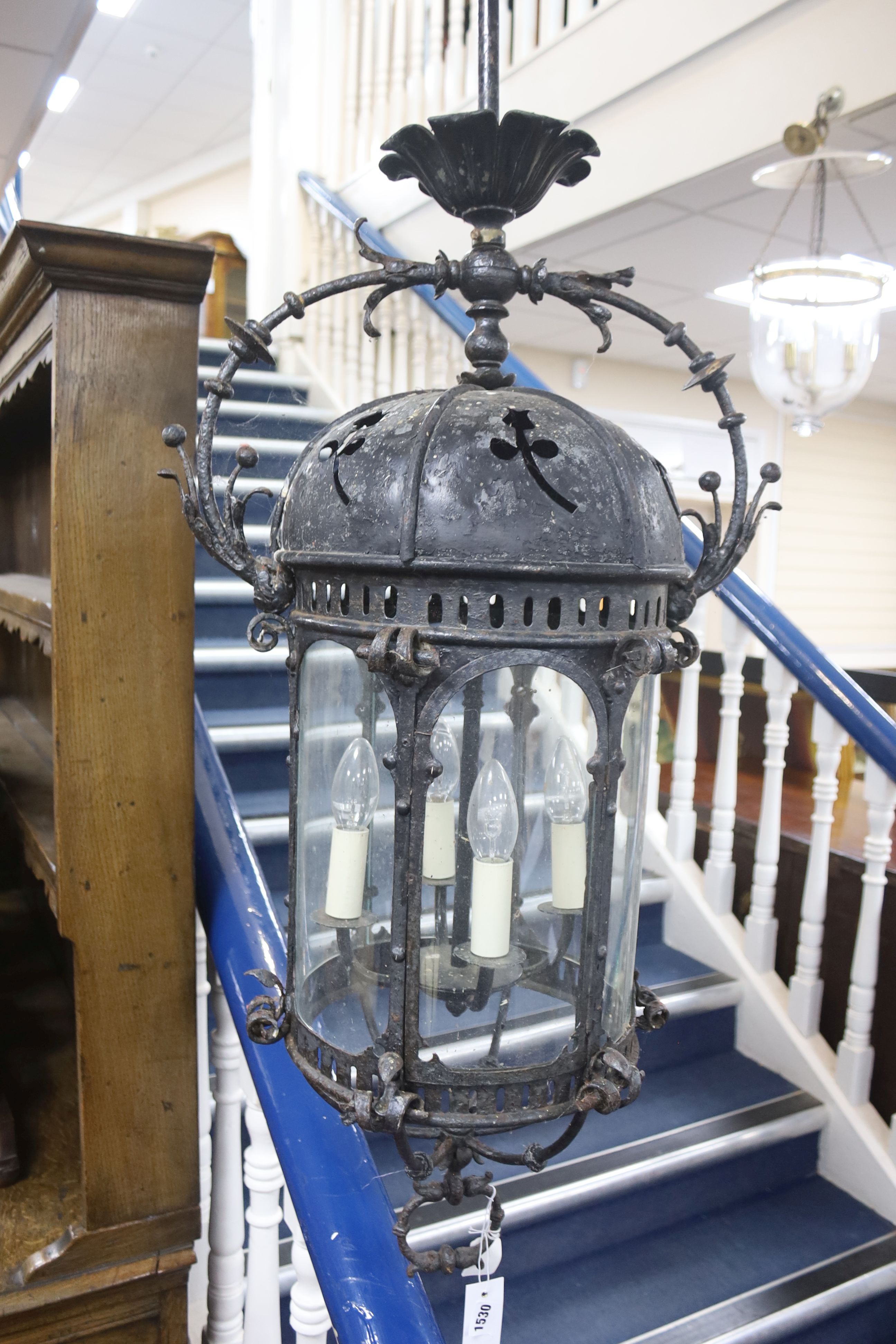 A late 19th /early 20th century wrought iron exterior lantern, height 148cm